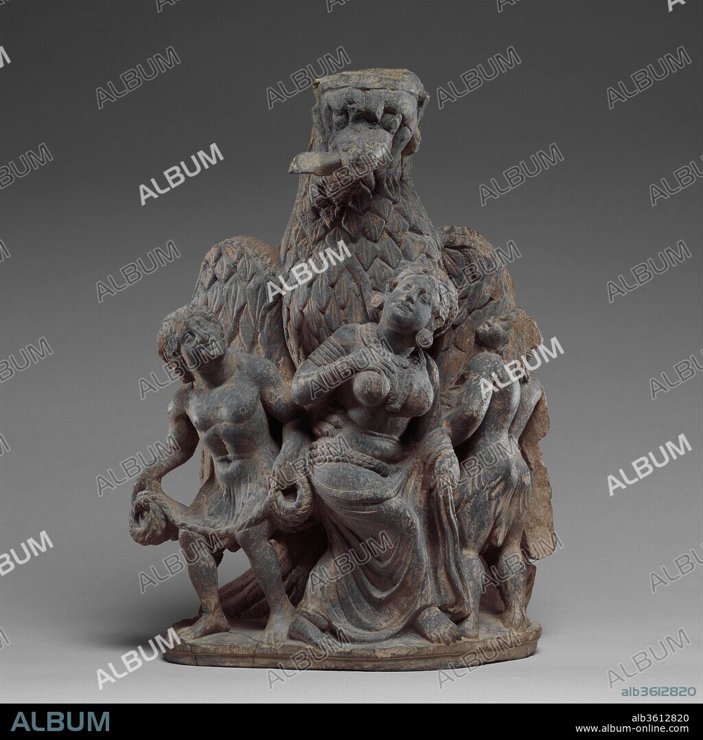 Garuda Vanquishing the Naga Clan. Culture: Pakistan (ancient region of Gandhara). Dimensions: H. 13 1/8 in. (33.3 cm); W. 9 7/8 in. (25.1 cm). Date: ca. 2nd-3rd century.
There are many jatakas (Buddhist tales) about the former lives of the Buddha. In this one, he was born as the king of Benares and ruled with his beloved queen, Kakati. The royal solar bird Garuda came to the court disguised as a man and gambled with the king. He then became enamored of the queen and abducted her. But when Garuda heard of the king's great sadness and of his true love for Kakati, he restored her to him.