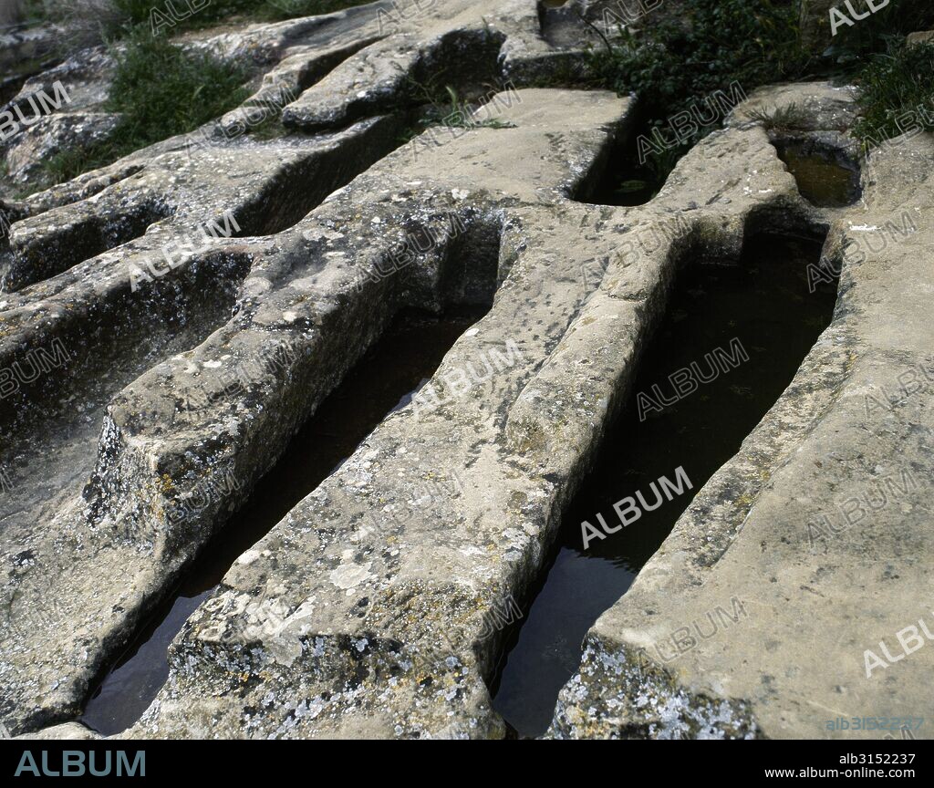 Early medieval necropolis. Anthropomorphic tombs carved in the rock. 9th-12th century. Near Church of St. John. Uncastillo, Province of Saragossa, Aragon, Spain.