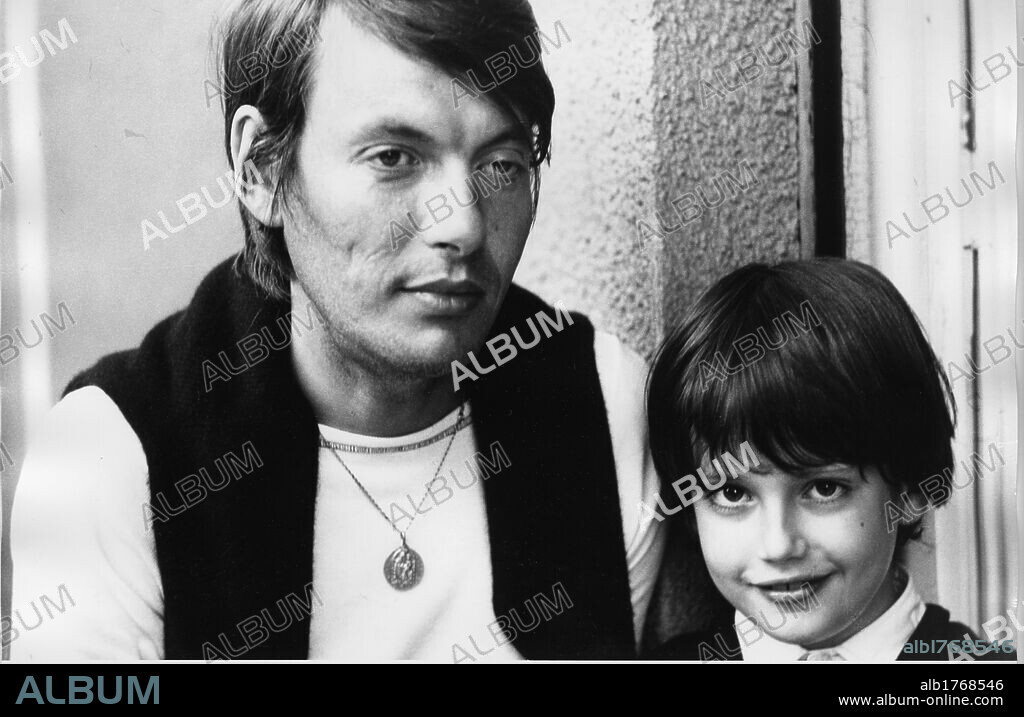 Portrait of Fabrizio De Andre with son Cristiano. Portrait of the Italian singer-songwriter Fabrizio De Andre with son Cristiano. 1970s.