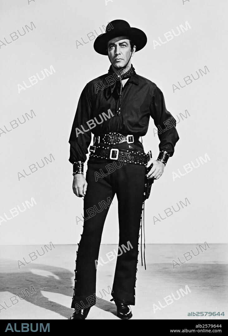 ROBERT TAYLOR in RIDE, VAQUERO!, 1953, directed by JOHN FARROW. Copyright M.G.M.