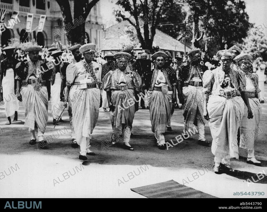 The Royal Visit To Kandy: Kandyan chiefs arrive in procession to attend the reception at Kandy. On April 19, during their 11-day visit to Ceylon, the queen and the Duke of Edinburgh visited Kandy, where they attended a reception in their honour. Given by Kandyan chiefs, and also watched the two-mile-long Raja Perahera procession. April 24, 1954. (Photo by Associated Press Photo).