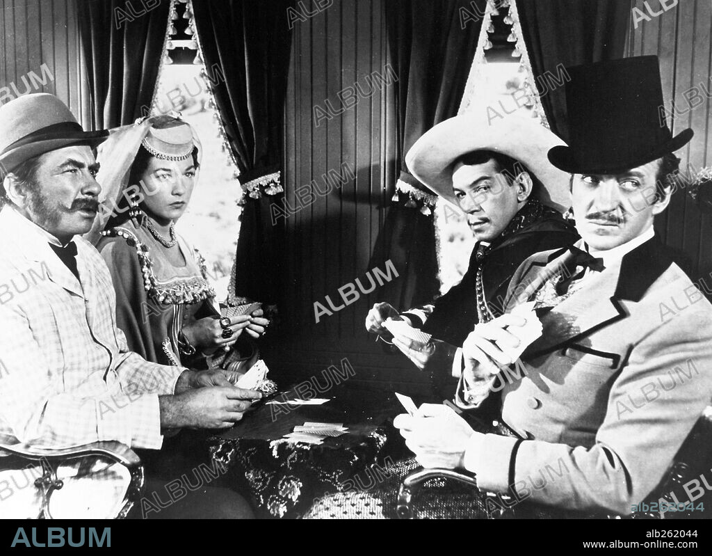 CANTINFLAS, DAVID NIVEN, ROBERT NEWTON and SHIRLEY MACLAINE in AROUND THE WORLD IN EIGHTY DAYS, 1956, directed by MICHAEL ANDERSON. Copyright UNITED ARTISTS.