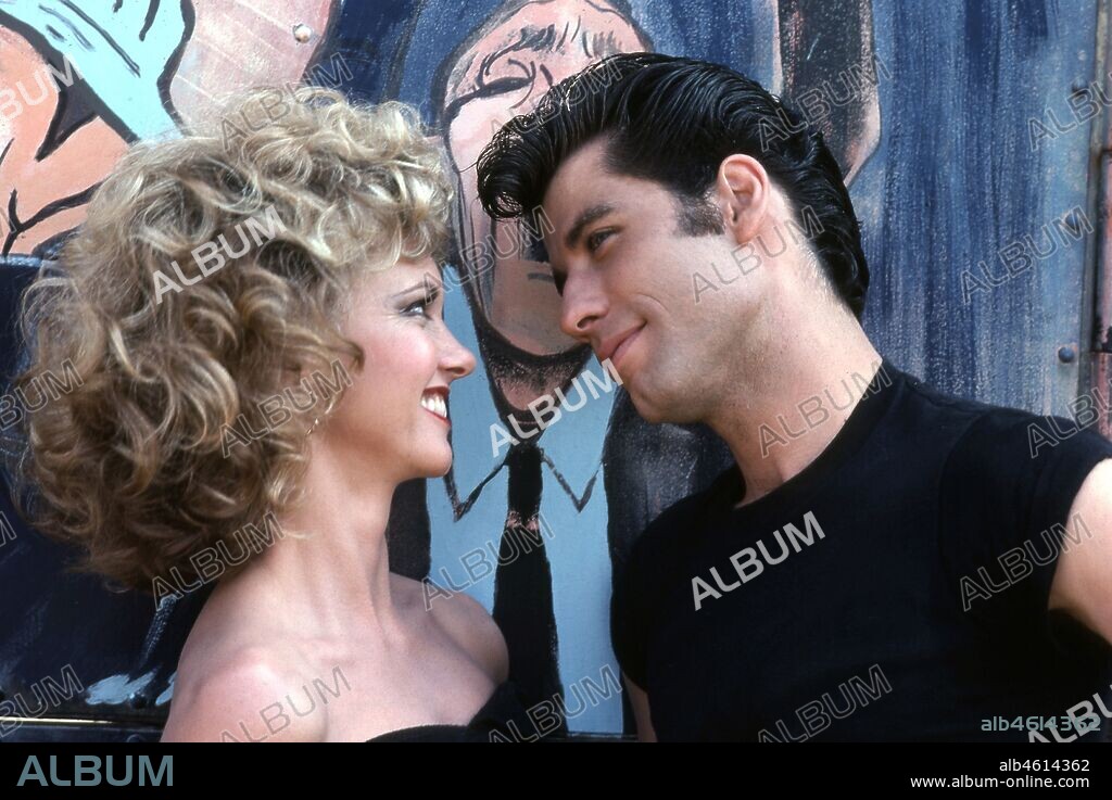 OLIVIA NEWTON JOHN y TRAVOLTA JOHN. JOHN TRAVOLTA y OLIVIA NEWTON-JOHN en GREASE, 1978, dirigida por RANDAL KLEISER. Copyright PARAMOUNT PICTURES.