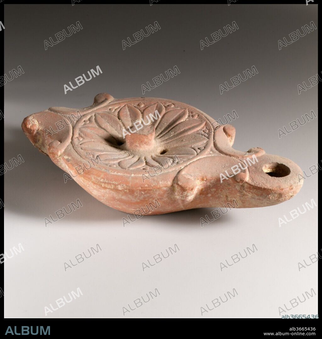 Terracotta oil lamp. Culture: Roman. Dimensions: Length: 6 1/4 in. (15.9 cm)
Height: 1 11/16 in. (4.3 cm). Date: 1st century B.C.-1st century A.D..