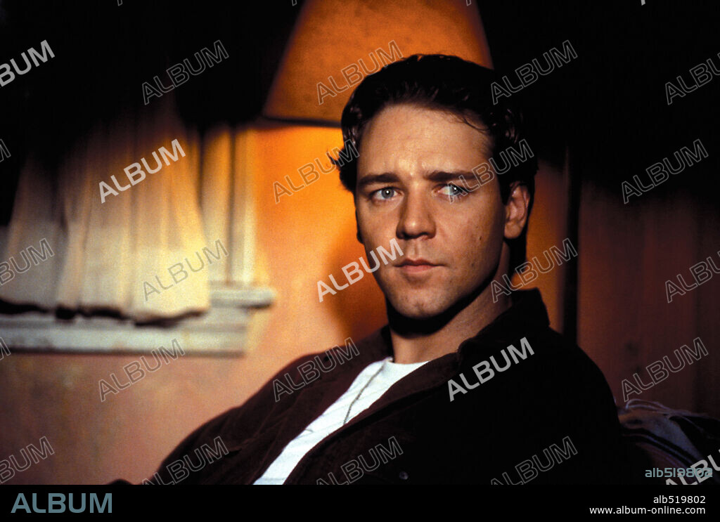 RUSSELL CROWE in BREAKING UP, 1997. Copyright WARNER BROS.