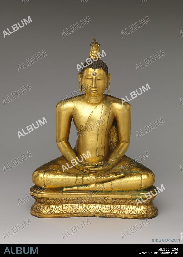 Buddha Seated in Meditation. Culture: Sri Lanka. western regions. Dimensions: H. 19 3/16 in. (48.7 cm); W. 14 3/16 in. (36 cm); D. 7 7/8 in. (20 cm). Date: 16th century.
This majestic Buddha is one of the finest products of sixteenth-century Sri Lankan Buddhist art. The figure is seated on a lotus-vine pedestal, deep in meditation. Numerous auspicious marks (lakshana) on his body signify his Buddhahood. Convention dictates thirty-two mahapurusalakshana and eighty lesser marks, such as the forehead mark (urna), flame protuberance (ushnisha), extended earlobes and locks of hair, and lotuses on the hand and feet.