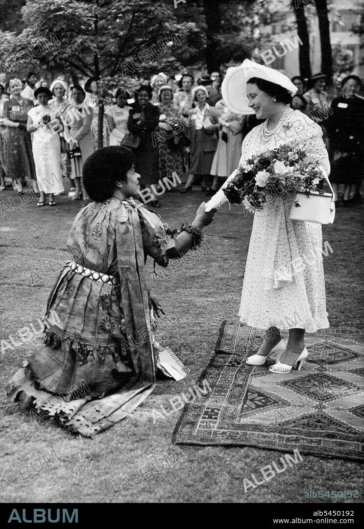 Queen Mother at Garden Party -- The Queen Mother receives Lady Maria Sukuna of Fiji.
Queen Elizabeth the Queen Mother attended a Garden Party held at Lambeth Palace (London residence of the Archbishop of Canterbury) June 25.
The Party was organised by the Women's Corona Club - A Church of England Club for Colonial Women. June 28, 1953. (Photo by Associated Press Photo).