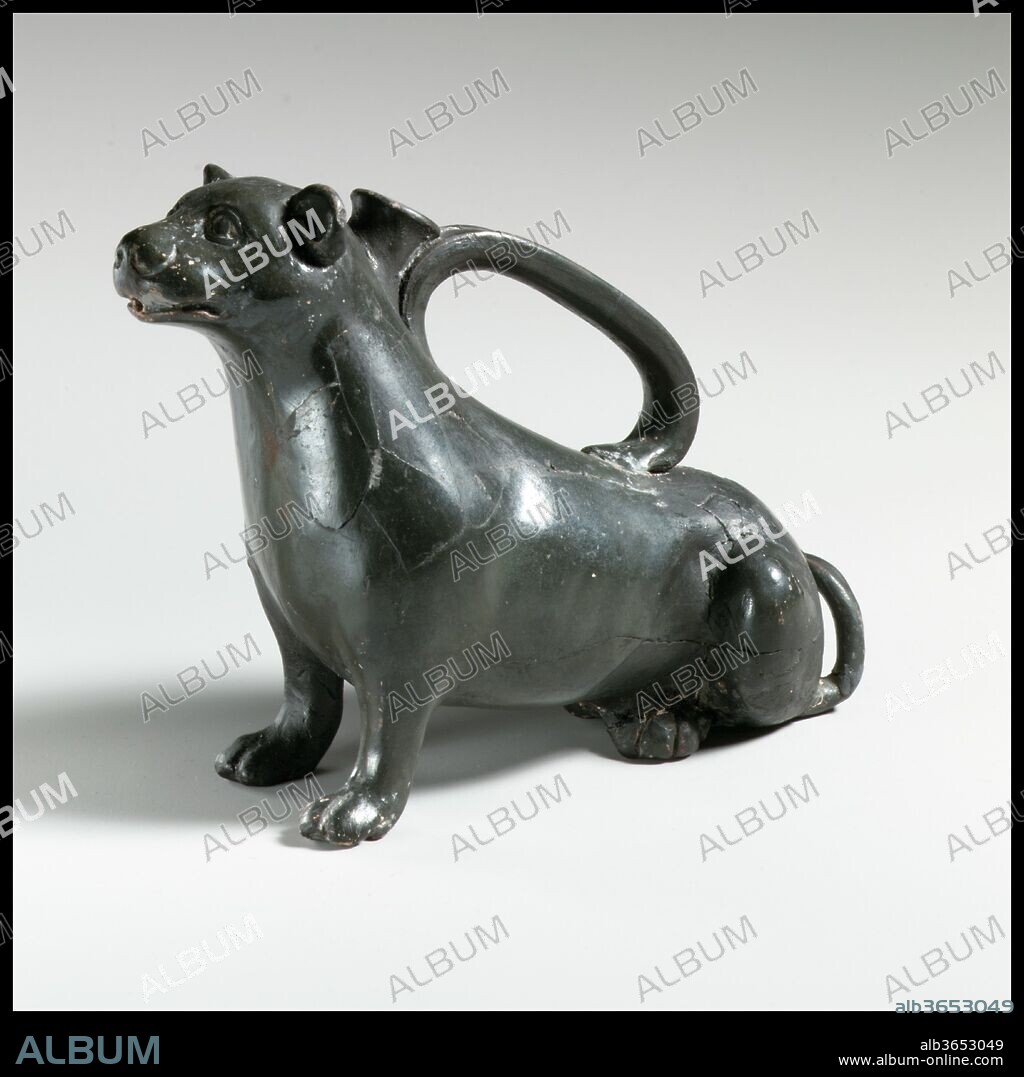 Terracotta askos in the form of a weasel. Culture: Greek, South Italian, Campanian. Dimensions: H. 4 7/8 in. (12.4 cm). Date: 4th century B.C..
With keen observation, utmost economy, and masterful sensitivity, the Campanian artists have rendered a weasel and a boar as they sit in charmed submission.