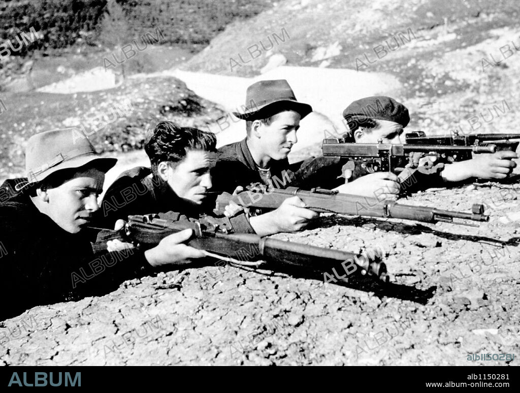 Italian guerrillas in the Apenines, May 1944: typical Italians who from the band of Guerrillas which is helping the Allied cause against the common enemy.