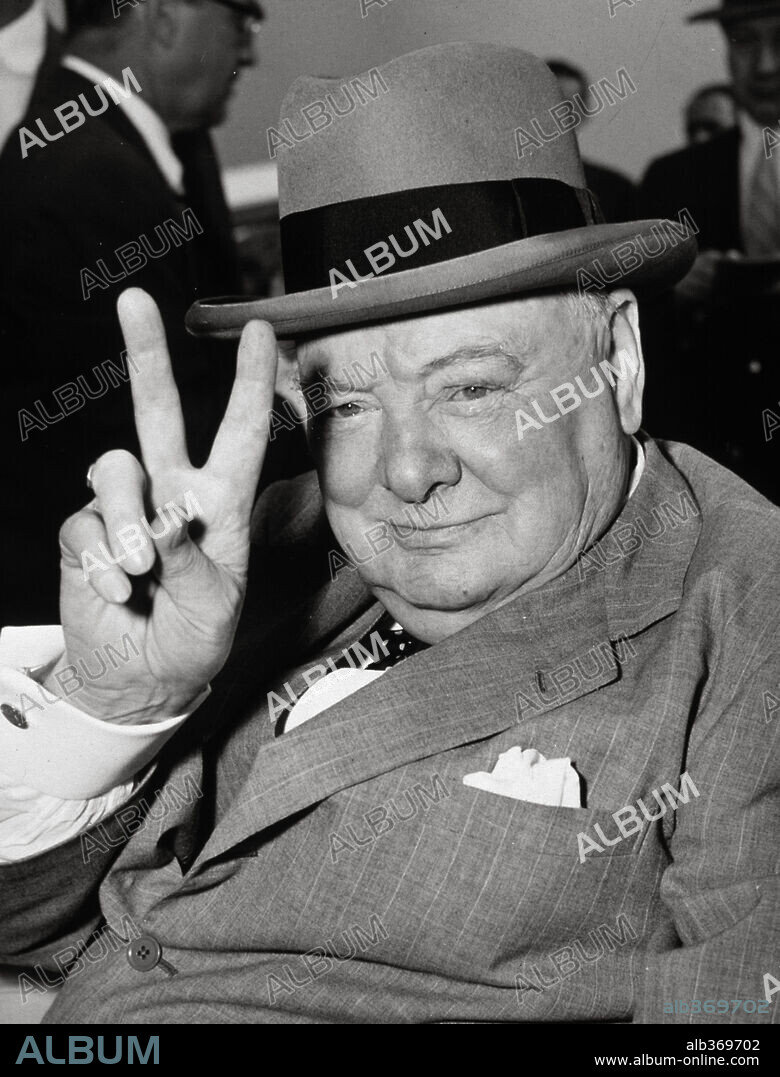 Winston Churchill waving the V sign.