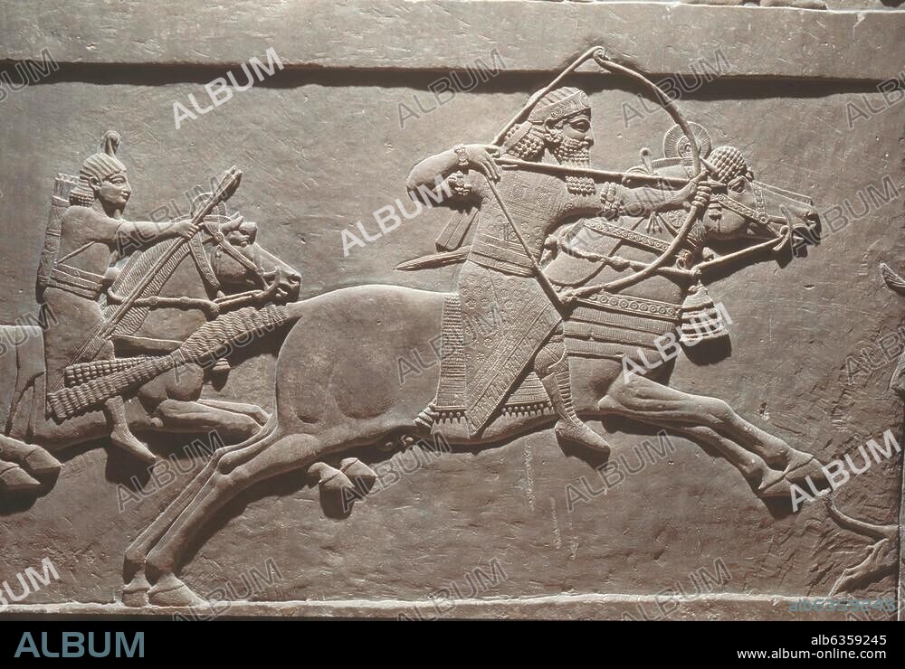 2406. ASSYRIAN CAVALRY, RELIEF FROM SENNACHERIB'S PALACE, NINVEH, C. 700 B.C. 'I saw by night and behold a man riding uppon a red horse' ZECHARIAH 1:8.