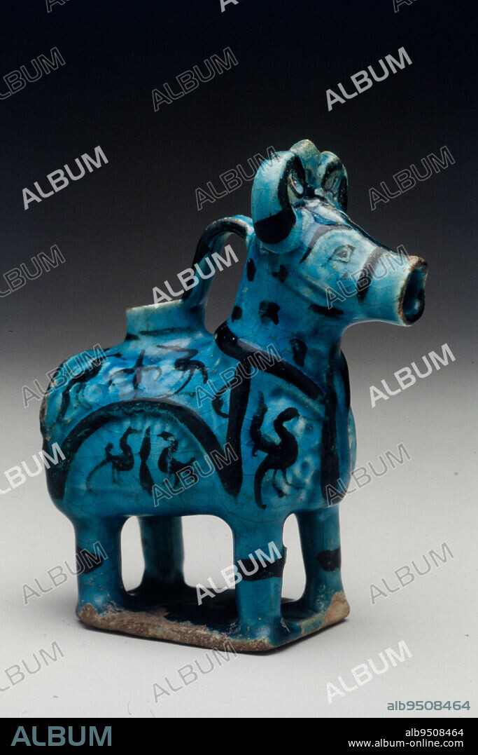 Aquamanile (Ram-shaped Ewer), 13th-14th century, 7 in. (17.78 cm), Stonepaste with clear turquoise glaze, black underglaze-painted decor, Kashan ware, Iran, Seljuk period (1038- c. 1194), Although round ceramic sculpture is relatively rare in Islamic art, decorated figures in both metal and ceramic ware were popular in Iran and Turkey during Seljuk rule. The bull shape, shown here in two examples, was the most common, but camel, ram, and lion-shaped vessels have survived as well.