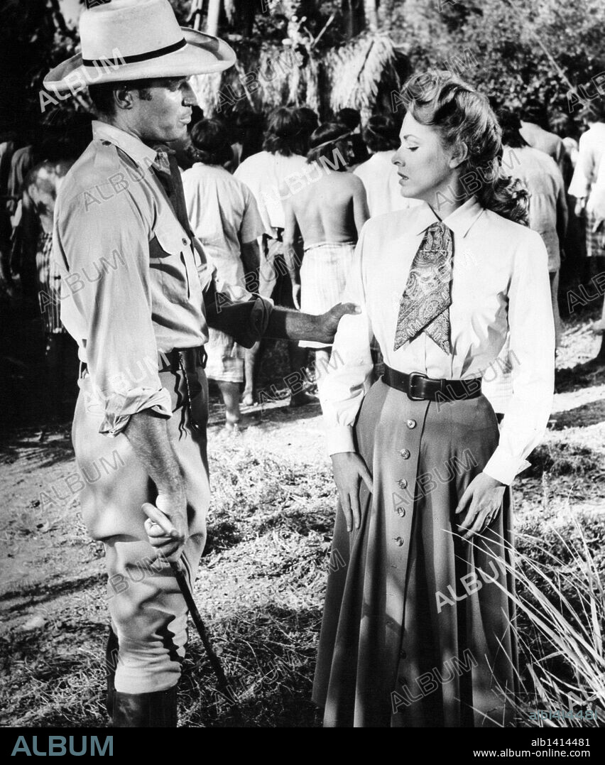 Eleanor Jane Parker y CHARLTON HESTON. CHARLTON HESTON y ELEANOR PARKER en CUANDO RUGE LA MARABUNTA, 1954 (THE NAKED JUNGLE), dirigida por BYRON HASKIN. Copyright PARAMOUNT PICTURES.