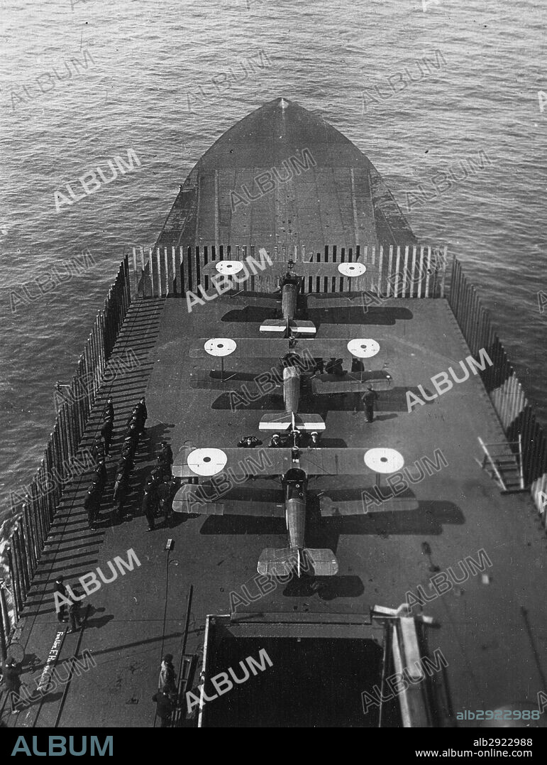 British Aircraft Carrier Furious, showing aeroplanes on the fling-off deck.  .