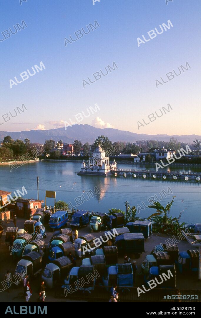 Rani Pokhari (Queen’s Pond), located off the northern end of the Tundikhel, is one of Kathmandu’s more attractive landmarks. The pond was dug between 1665 and 1670 by King Pratapa Malla to comfort his wife Bhavan Lakshmi over the death of their son Chakrabatindra Malla who had been trampled to death by an elephant. In later years, the pond was used for trial by ordeal, in which the representatives of two conflicting parties had to submerge themselves in the water, the one with the greater lung capacity winning the case. With the beginning of Rana rule the ordeals were discontinued.