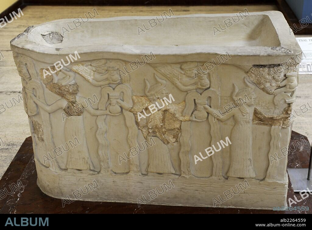 Sacred Basin. Gift of Gudea, governor of Lagash, to the temple of the God Ningirsu. Gudea Period. 2144-2124 BC. Relief depicting winged goddess reaching and holding a round based vessel. Museum of the Ancient Orient. Istanbul. Turkey.