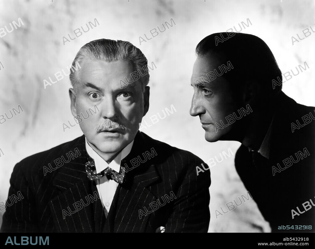 BASIL RATHBONE and NIGEL BRUCE in THE ADVENTURES OF SHERLOCK