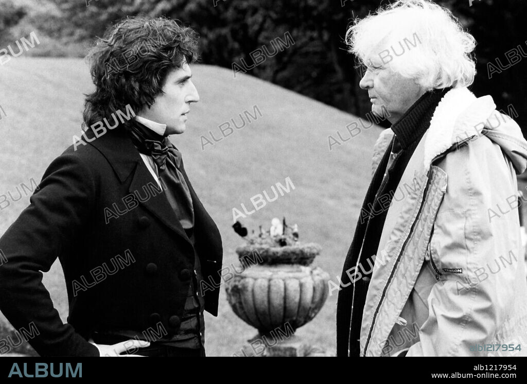 GABRIEL BYRNE and KEN RUSSELL in GOTHIC, 1986, directed by KEN RUSSELL. Copyright VIRGIN VISIONS.