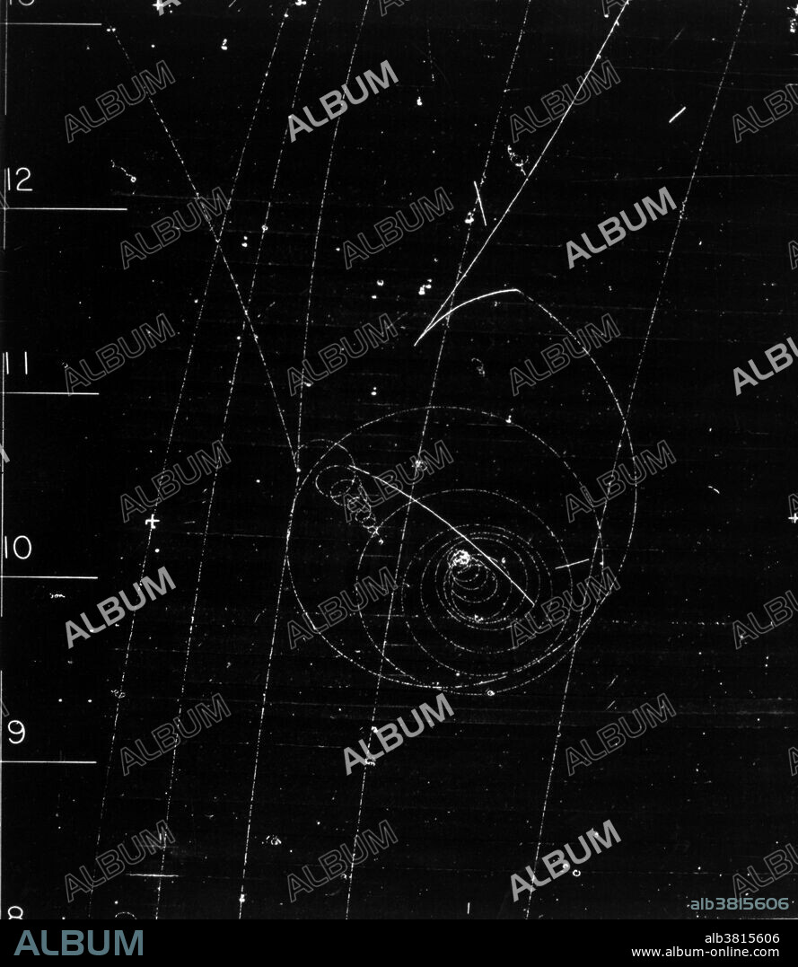 Bubble chamber event: a rare decay of a lambda into a negative muon, a proton, and a neutrino is photographed in the 72 inch Hydrogen Bubble Chamber, May 1962. A bubble chamber is a vessel filled with a superheated transparent liquid (most often liquid hydrogen) used to detect electrically charged particles moving through it.