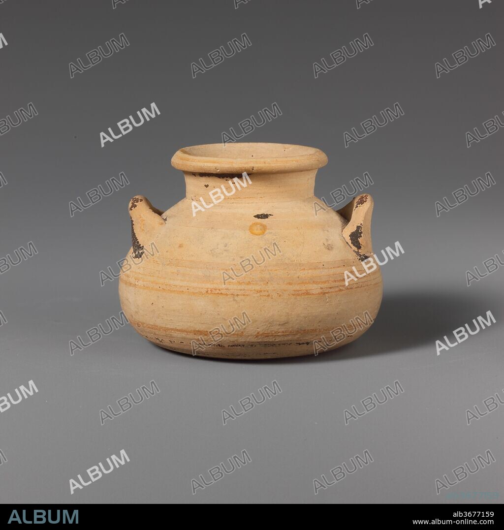 Terracotta alabastron (jar). Culture: Mycenaean. Dimensions: H. 1 3/4 in. (4.5 cm.). Date: ca. 1600-1050 B.C..
Low body and two small handles.