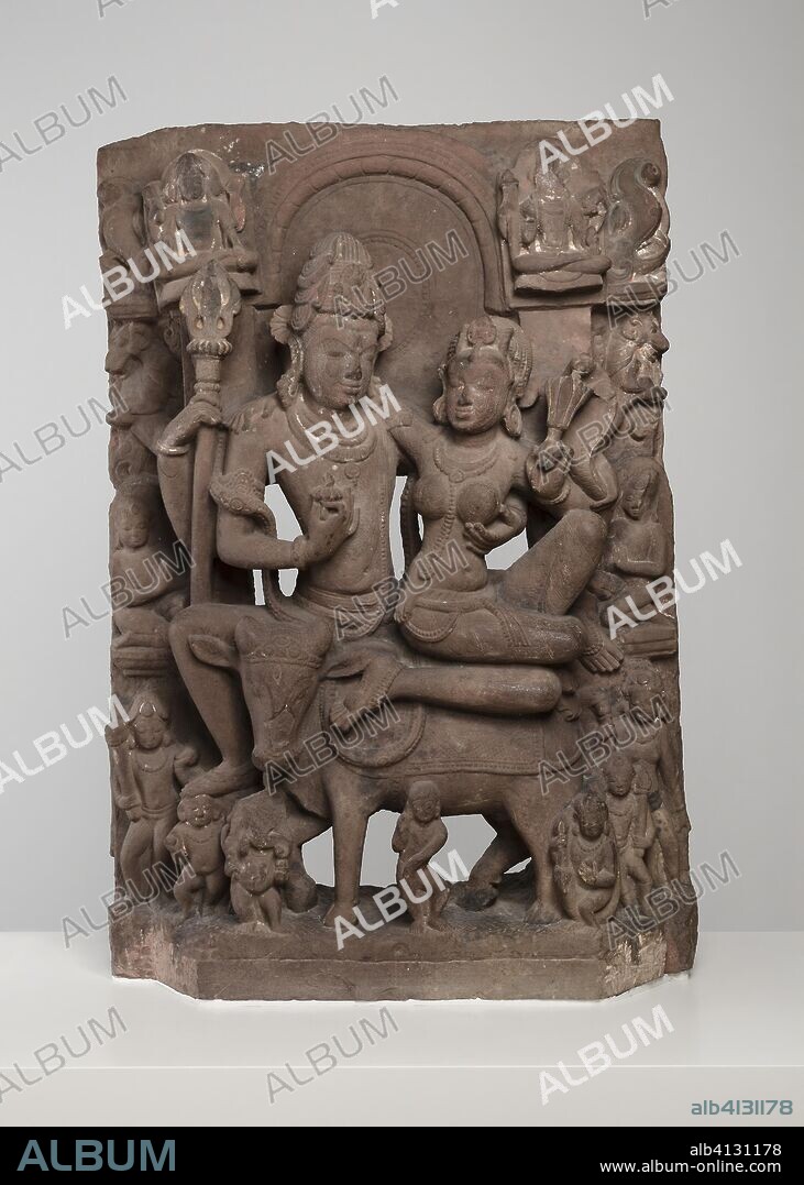 God Shiva Seated in Loving Embrace with Goddess Uma on the Bull Nandi. India; Madhya Pradesh. Date: 801 AD-900 AD. Dimensions: 79.4 × 53.3 × 18.6 cm (31 1/4 × 21.0 × 7 5/16 in.). Sandstone. Origin: Madhya Pradesh.