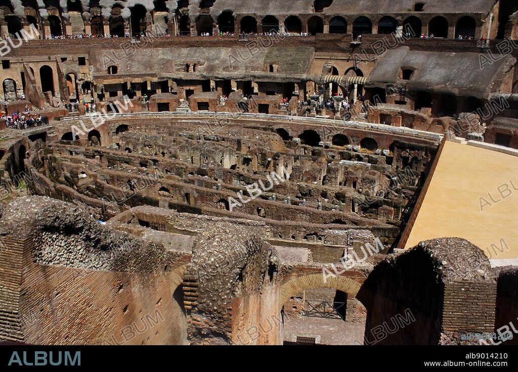 The Roman Collosseum (also known as the Flavian Amphitheatre), an elliptical amphitheatre in the centre of Rome, Italy. Considered one of the greatest works of Roman architecture and engineering. Built from concrete and stone, with construction starting under the emperor Vespasian in 70 AD, finished in 80 AD under Titus. The amphitheatre also underwent modifications during the reign of Domitian. Named for its association with the Flavius family name of which these 3 emperors belonged. The Collosseum seated 50,000 spectators to view gladiatorial contests and performances. It was later repurposed for many other uses. One of the outstanding physical representations of Imperial Rome.