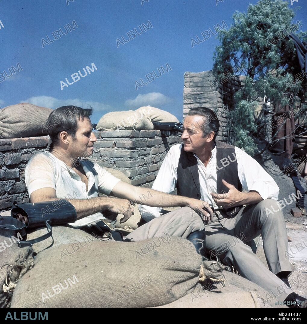 CHARLTON HESTON and DAVID NIVEN in 55 DAYS AT PEKING, 1963, directed by NICHOLAS RAY. Copyright SAMUEL BRONSTON PRODS/ALLIED ARTISTS.