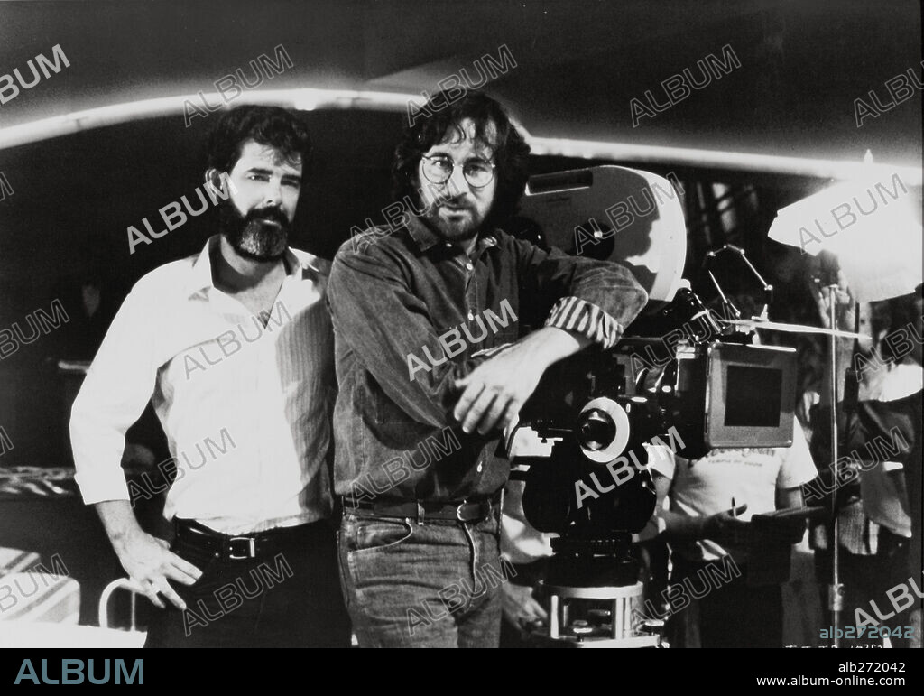 GEORGE LUCAS and STEVEN SPIELBERG in INDIANA JONES AND THE TEMPLE OF DOOM, 1984, directed by STEVEN SPIELBERG. Copyright LUCASFILM LTD/PARAMOUNT.