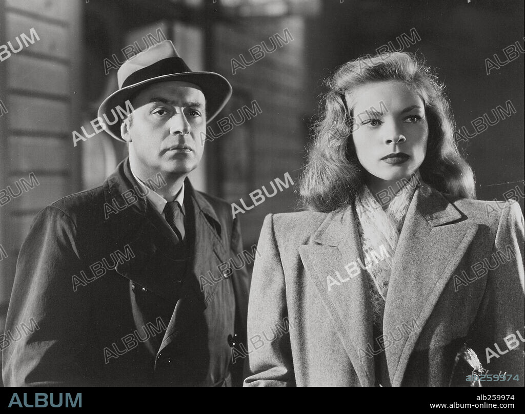 CHARLES BOYER y LAUREN BACALL en AGENTE CONFIDENCIAL, 1945 (CONFIDENTIAL AGENT), dirigida por HERMAN SHUMLIN. Copyright WARNER BROTHERS.