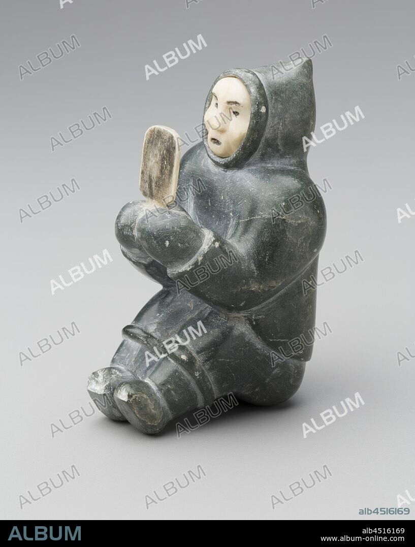 Inuit, Native American, Figure with Mirror, between 1950 and 1955, soapstone, ivory and pigment, Overall: 4 1/2 × 2 1/2 × 4 inches (11.4 × 6.4 × 10.2 cm).