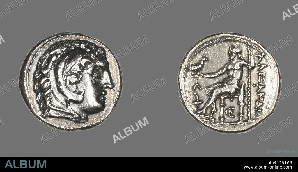 ANCIENT GREEK. Tertradrachm (Coin) Portraying Alexander the Great as Herakles. Greek, minted in Amphipolis, Macedonia. Date: 336 BC-323 BC. Dimensions: Diam. 2.7 cm; 16.96 g. Silver. Origin: Greece.