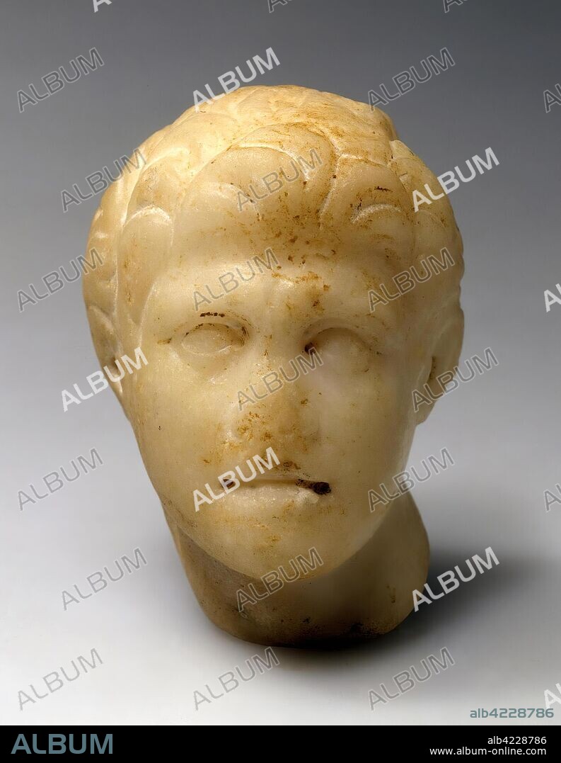 'Head of Alexander the Great (fragment of a statuette)'. Asia Minor, roman copy of 1st century BC. Dimensions: h. 6 cm.