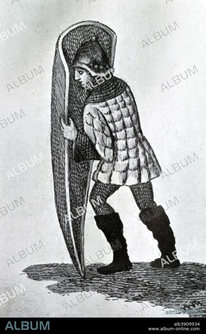The military pourpoint, 15th century, (1910). The pourpoint was a short jacket made by sewing or quilting two layers of fabric with padding between, used by soldiers under armour to prevent chafing. Illustration from British Costume during 19 Centuries by Mrs Charles H Ashdown, (London, 1910).