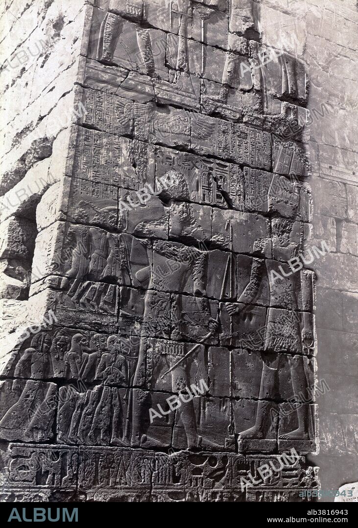 Bas-relief on wall of the Royal Pavilion, Thebes, photographed by Maison Bonfils, circa 1867-85. The Temple of Khonsu located within the large Precinct of Amun-Re at Karnak is an example of an almost complete New Kingdom temple, and was originally constructed by Ramesses III, on the site of an earlier temple. In Ptolemaic times, Ptolemy III Euergetes constructed a great gateway and enclosure wall for the temple, only the gateway now remains. The Karnak Temple Complex comprises a vast mix of decayed temples, chapels, pylons, and other buildings. Building at the complex began during the reign of Senusret I in the Middle Kingdom and continued into the Ptolemaic period, although most of the extant buildings date from the New Kingdom. The area around Karnak was the ancient Egyptian Ipet-isut (The Most Selected of Places) and the main place of worship of the eighteenth dynasty Theban Triad with the god Amun as its head. It is part of the monumental city of Thebes. The complex is a vast open-air museum and the largest ancient religious site in the world. FÃ©lix Bonfils (March 8, 1831 - 1885) was a French photographer and writer who was active in the Middle East.