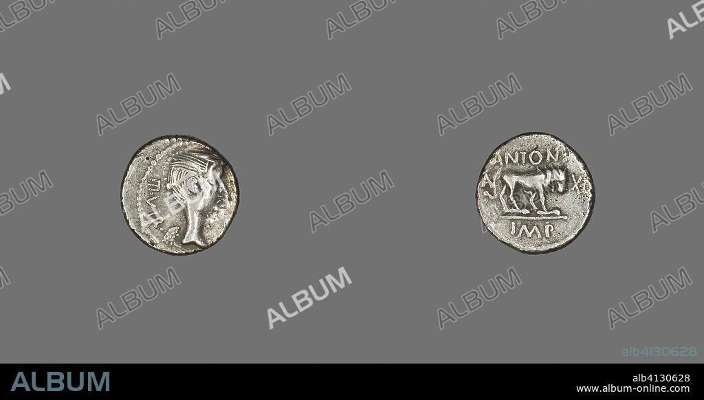 ANCIENT ROMAN. Quinarius (Coin) Depicting the Goddess Victory. Roman, minted in Gallia Trans-Cisalp. Date: 43 BC-42 BC. Dimensions: Diam. 1.3 cm; 1.64 g. Silver. Origin: Italy.