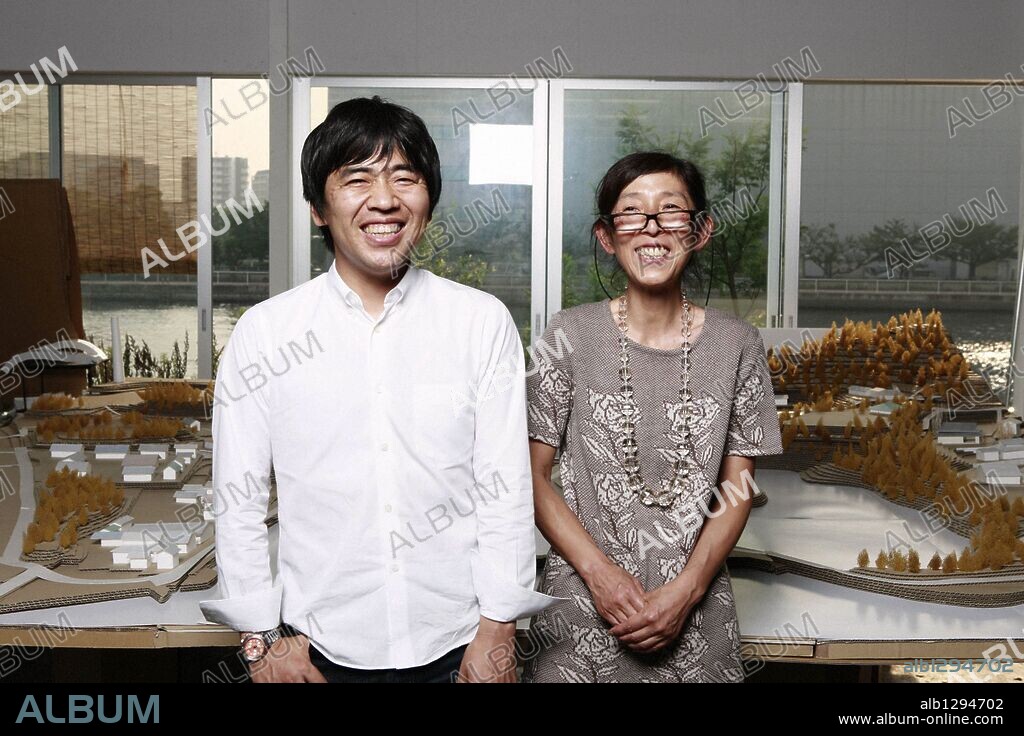 Jun 25, 2009 - Tokyo, Japan - RYUE NISHIZAWA, left, and KAZUYO SEJIMA of SANAA in their Tokyo office.Ê Every year since 2000, the Serpentine Gallery in London commissions a globally notable architect who has not yet built in the U.K. to design a summer pavilion in their garden in Kensington. The Serpentine Gallery Pavilion 2009 was designed by Kazuyo Sejima and Ryue Nishizawa of leading Japanese architecture practice SANAA. (Credit Image: © Ko Sasaki/ZUMA Press). 25/06/2009