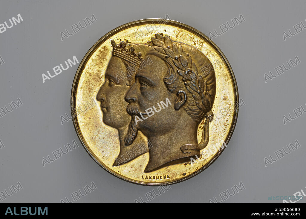 prize medal, Labouche, 1867, General: 5 x 0.3cm (50 x 3mm), Weight: 47.8g, double portrait, building, male, female, Gilded silver prize medal, minted for the Paris World's Fair, 1867. On the obverse the heads of a male figure and a female figure: Emperor Napoleon III and the Empress, both facing left, depicted one behind the other. Napoleon III wears a small beard and mustache and has a laurel wreath on his head. The empress is wearing a crown. Under the headings is LABOUCHE. On the reverse is the entrance to the exhibition, with flowing streamers. Human figures are depicted in front of the building. Below is the inscription EXPOSITION UNIV.LE 1867, 1940.