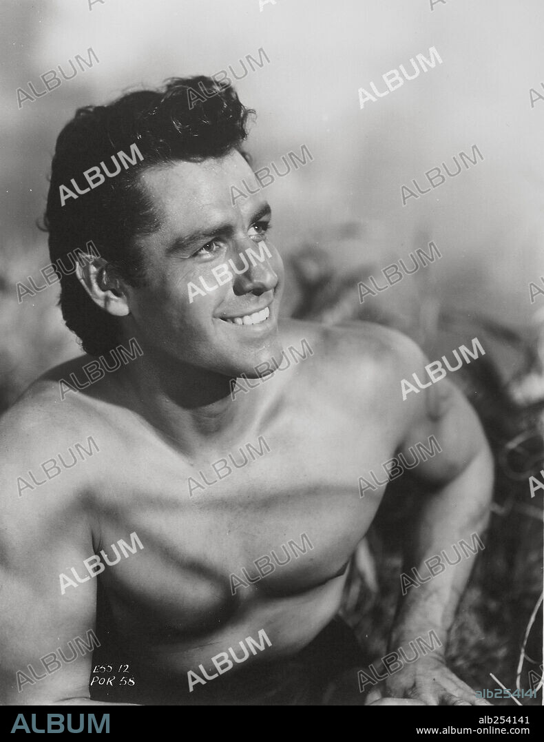 GORDON SCOTT in TARZAN AND THE LOST SAFARI, 1957, directed by H. BRUCE HUMBERSTONE. Copyright M.G.M.