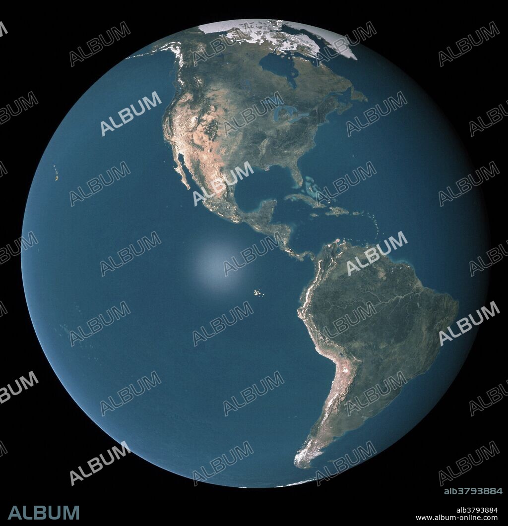 Americas. True-color satellite image of the whole Earth centered on the Americas. North is at top. Oceans are blue, vegetation is dark green and mountains are brown. North America (upper center) and South America (lower right) are connected by the thin stretch of land that forms Central America. The Arctic (white) is at North. This image is a composite of many cloudless images taken by the AVHRR (Advanced Very High Resolution Radiometer) on a TIROS weather satellite.