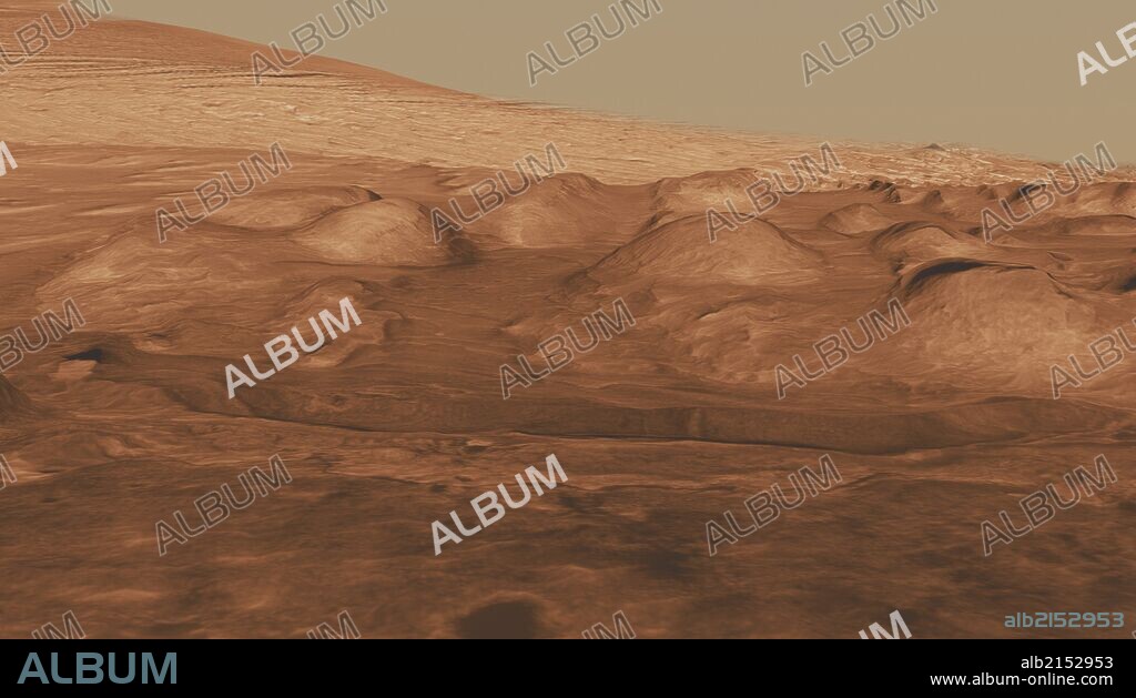 This oblique view of the lower mound in Gale crater shows layers of rock that preserve a record of environments on Mars. (Photo by: Universal History Archive/UIG via Getty Images).