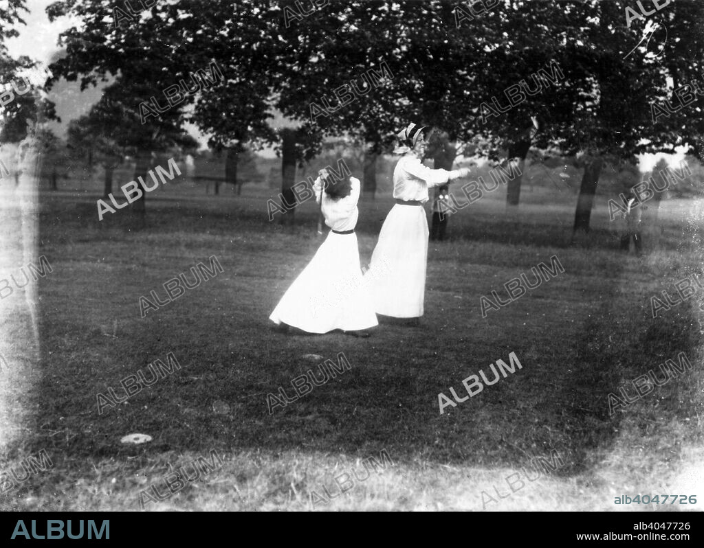 Ladies on the golf links, Bulwell Hall Park, Nottingham, Nottinghamshire, 1910. John Newton built the new Bulwell Hall in 1770 and it was first called Pye Wipe Hall (the old hall was known as Bulwell Wood Hall, and was situated at Hempshill). He died on November 13th 1820. His son, who should have acquired the estate, died twelve days later on the 25th. Upon the death of these, his grandfather and uncle, the Rev Alfred Padley acquired the sstate and hall by will. The hall was described by Pevsner as a handsome stuccoed house of five bays, two and a half storeys, with a one storey porch, a central venetian window and wings at right angles but connected by curving colonnades. The house was demolished in 1958, though the parkland is still used for sporting activities, such as football, cricket, golf/putting and fishing.
