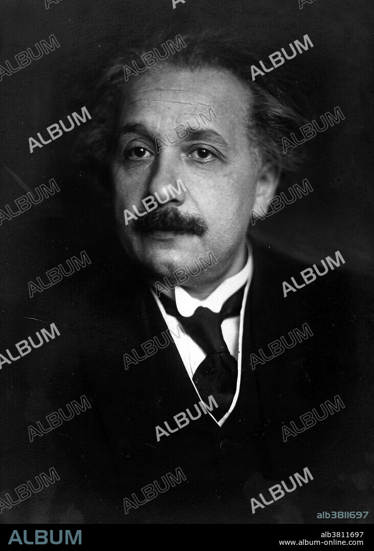 Albert Einstein (March 14, 1879 - April 18, 1955) was a German-born theoretical physicist. He developed the general theory of relativity, one of the two pillars of modern physics. He is best known in popular culture for his mass-energy equivalence formula E = mc2. He received the 1921 Nobel Prize in Physics "for his services to Theoretical Physics, and especially for his discovery of the law of the photoelectric effect". He was visiting the US when Hitler came to power in 1933, and did not go back to Germany. He settled in America becoming a citizen in 1940. He helped alert President Roosevelt that Germany might be developing an atomic weapon, and recommended that the US begin similar research. He was in support of defending the Allied forces, but largely denounced using the discovery of nuclear fission as a weapon. Later, together with Bertrand Russell, Einstein signed the Russell-Einstein Manifesto, which highlighted the danger of nuclear weapons. Einstein was affiliated with the Institute for Advanced Study in Princeton until his death in 1955, at the age of 76. His great intelligence and originality have made the word Einstein synonymous with genius.