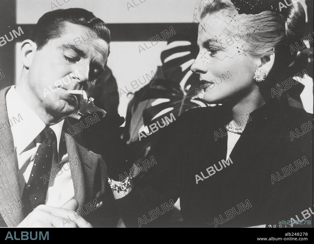 DANA ANDREWS y JOAN FONTAINE en MÁS ALLÁ DE LA DUDA, 1956 (BEYOND A REASONABLE DOUBT), dirigida por FRITZ LANG. Copyright RKO.