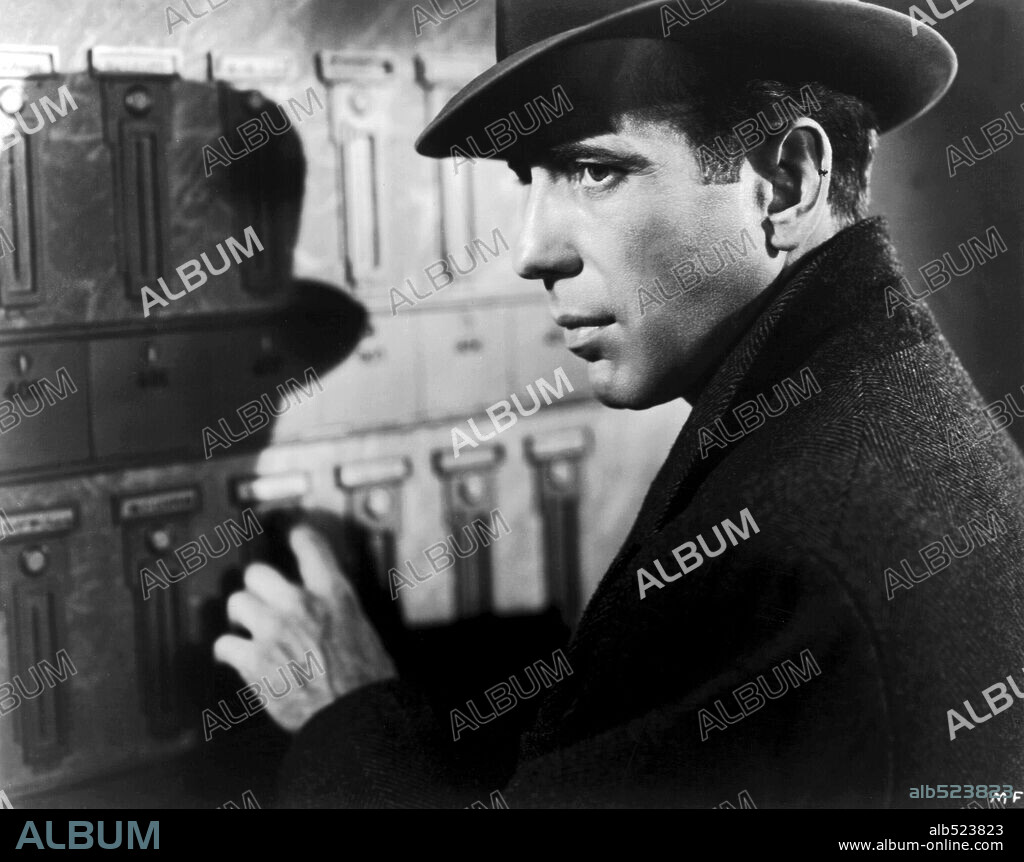 HUMPHREY BOGART en EL HALCÓN MALTÉS, 1941 (THE MALTESE FALCON), dirigida por JOHN HUSTON. Copyright WARNER BROS/FIRST NATIONAL.