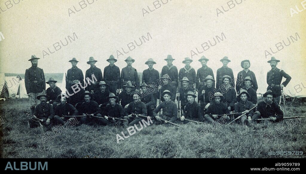 Photographic print of Theodore Roosevelt's Rough Riders, Company B, at a military camp, Montauk Point, New York. Photographed by Frances Benjamin Johnston (1864-1952) an American female photographer and photojournalist. Dated 1898.