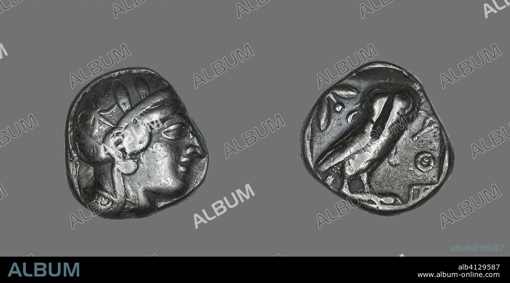 ANCIENT GREEK. Tetradrachm (Coin) Depicting the Goddess Athena. Greek, minted in Athens. Date: 514 BC-509 BC. Dimensions: Diam. 2.4 cm; 16.87 g. Silver. Origin: Athens.