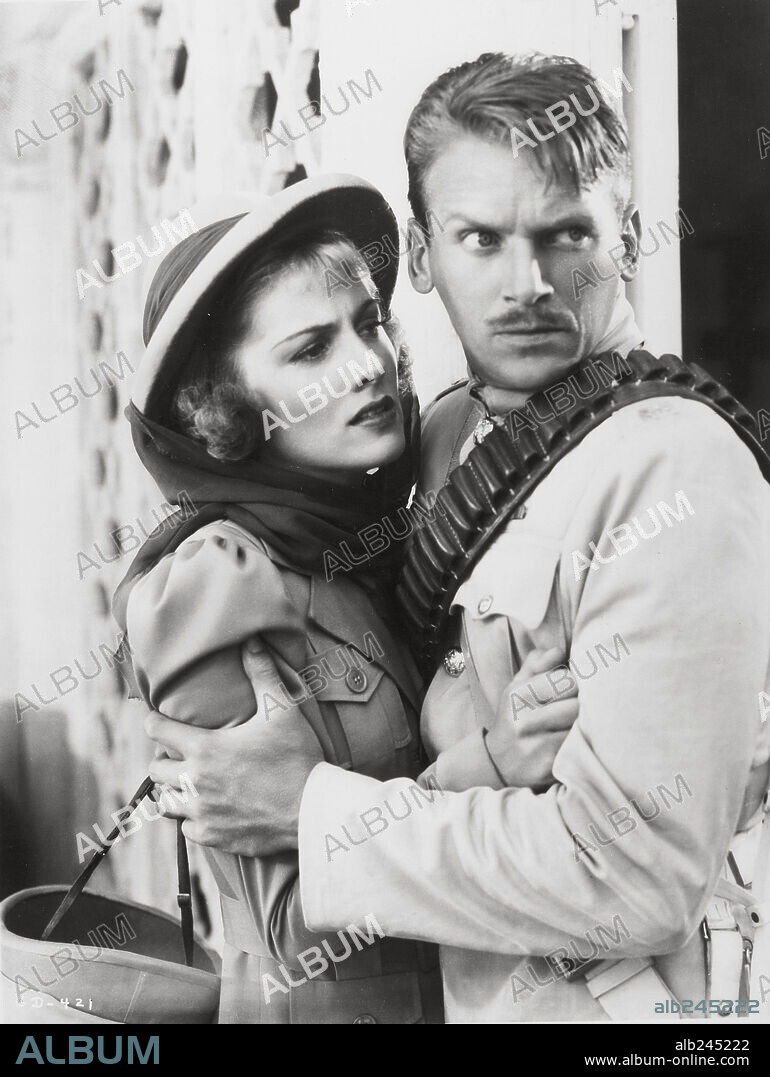 DOUGLAS FAIRBANKS JR. and JOAN FONTAINE in GUNGA DIN, 1939, directed by GEORGE STEVENS. Copyright RKO.