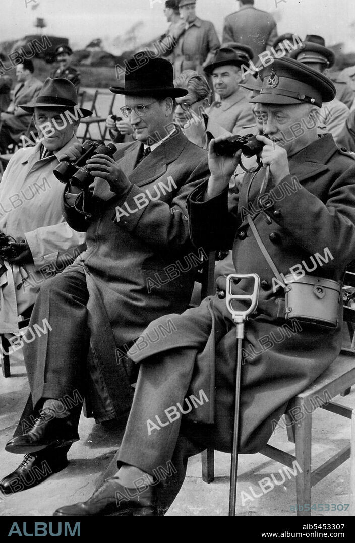 General Speidel At R.A.S.C. Demonstration -- Lieutenant-General Hans Speidel, Rommel's former Chief of Staff, watching a demonstration at the Royal Army Service Corps depot here with (right) General Sir Kenneth Crawford, Senior Controller of Supplies and Munitions, Ministry of Supply and (left) General Philips, on General Speidel's staff. May 01, 1953. (Photo by United Press Photo).