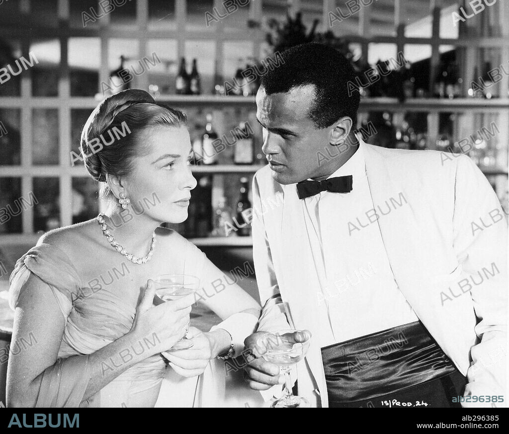 HARRY BELAFONTE and JOAN FONTAINE in ISLAND IN THE SUN, 1957, directed by ROBERT ROSSEN. Copyright 20TH CENTURY FOX.