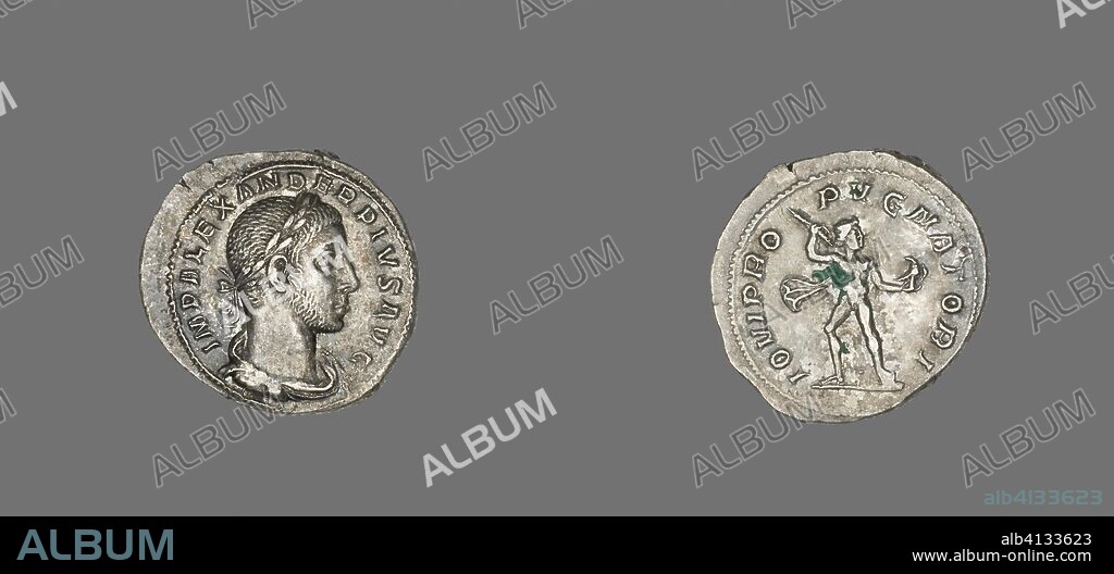 ANCIENT ROMAN. Denarius (Coin) Portraying Emperor Alexander. Roman. Date: 231 AD-235 AD. Dimensions: Diam. 2 cm; 3.34 g. Silver. Origin: Rome.